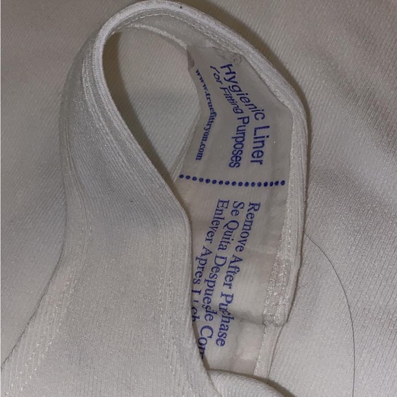 OFF WHITE SLEEVELESS RIBBED BODYSUIT - Picture 4 of 8